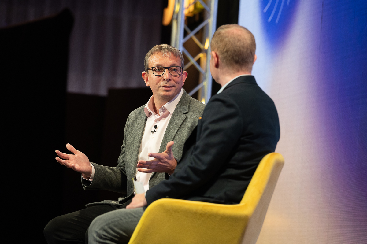 Hilton's Chris Silcock (left) speaks with Skift's Sean O'Neil at the Skift Future of Lodging Summit in London March 29, 2023.