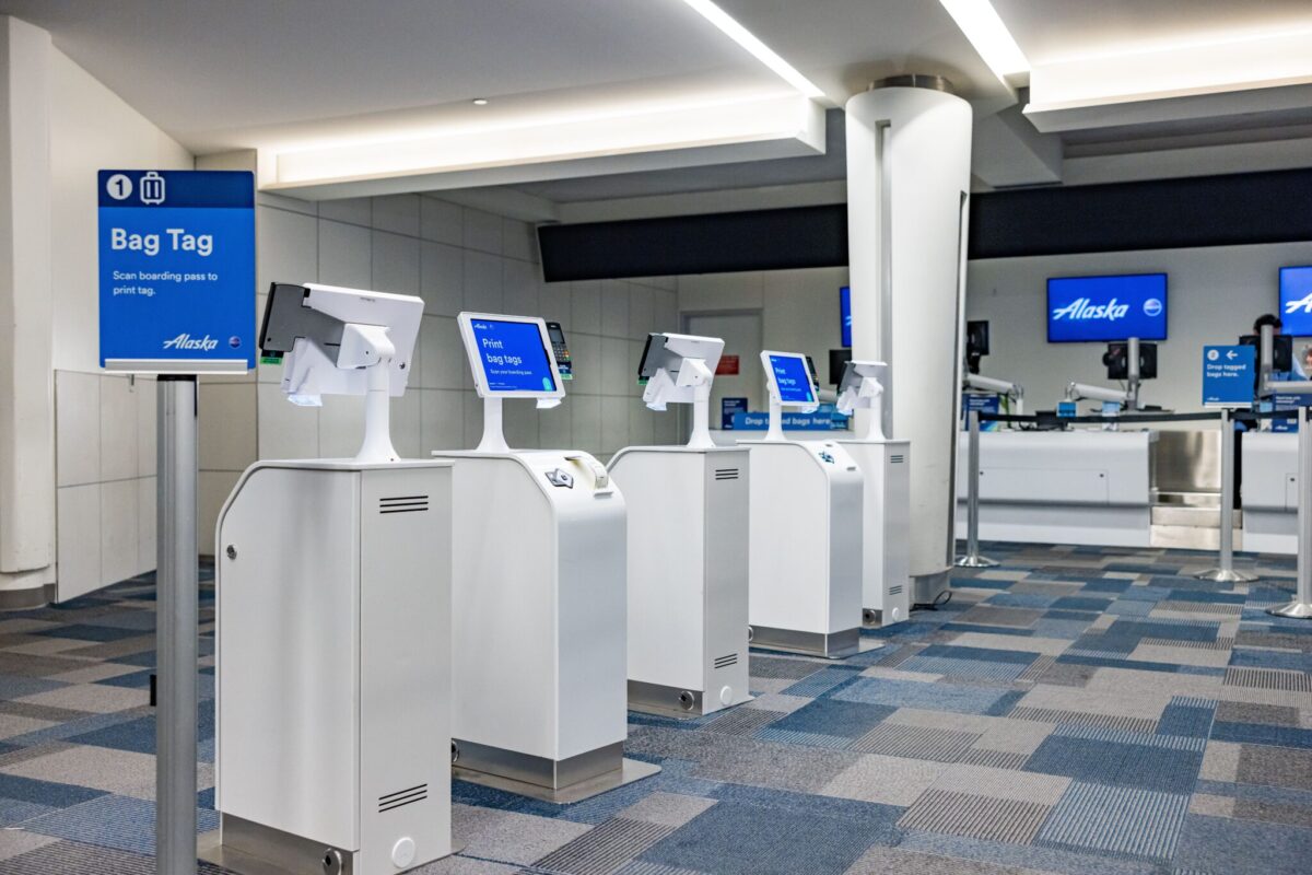 Pictured is a rendering of a future Alaska Airlines bag tag station. Source: Alaska Airlines