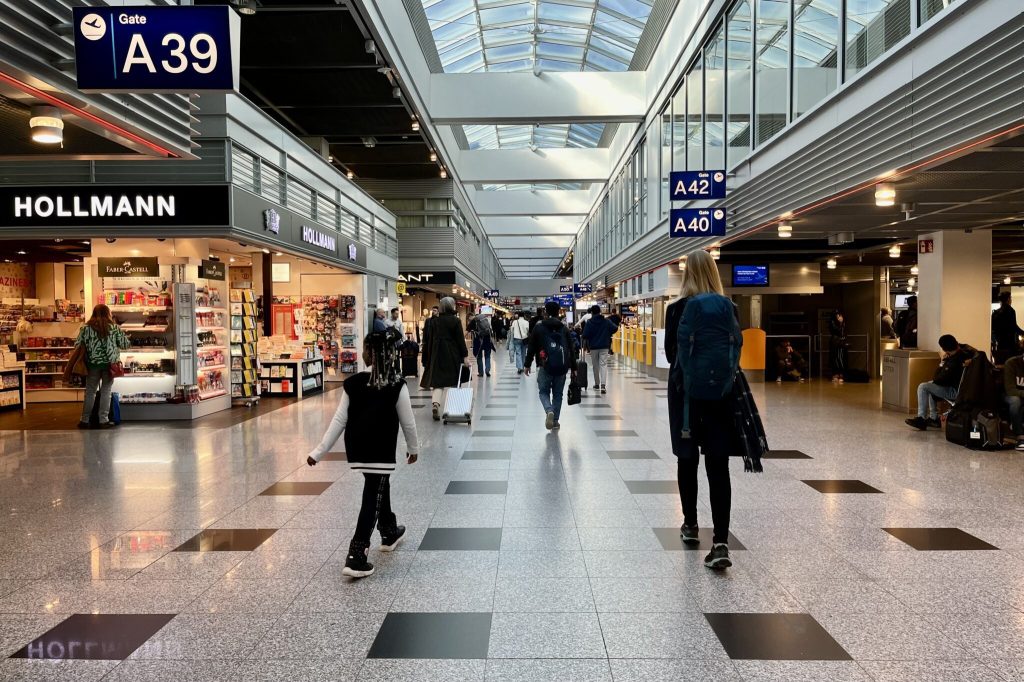 Passengers inside Dusseldorf's international airport