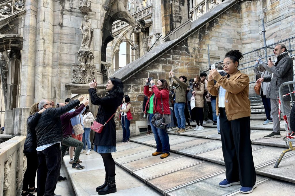 Tourists taking photos on the roof of Milan’s cathedral