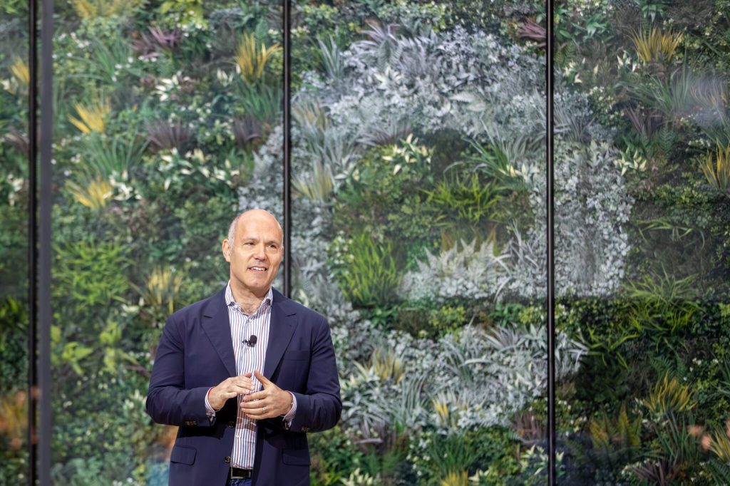 Expedia Group CEO Peter Kern speaks at its Seattle headquarters on May 9, 2023, to partners at the company's annual Explore conference