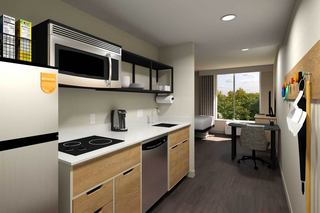 A Hilton hotel room with a kitchen space