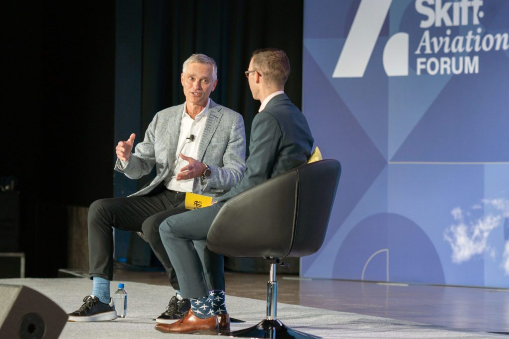 American Airlines CEO Robert Isom speaking on stage