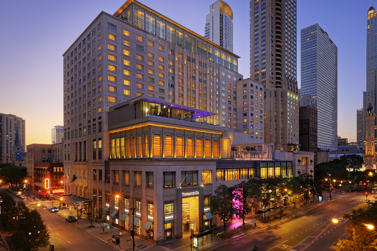 Exterior, at dusk, of The Peninsula Chicago. Source: The Peninsula Hotels.