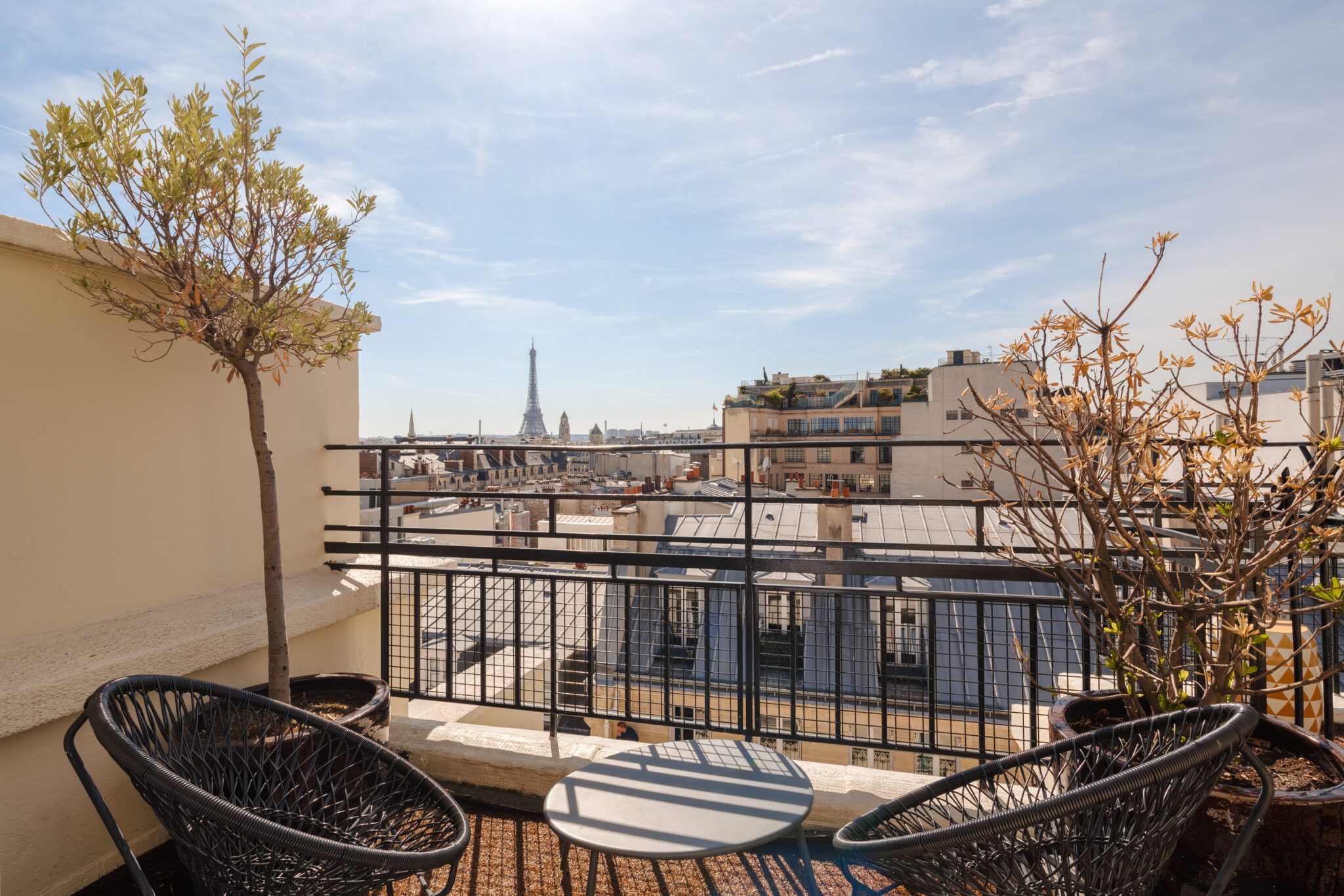 A view from Atala powered by Sonder in Paris, France, with the Eiffel Tower in the background. Source: Sonder
