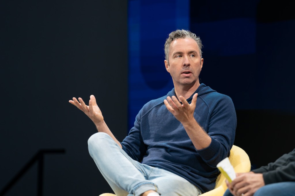 Hopper CEO and co-founder Frederic Lalonde speaking on a stage