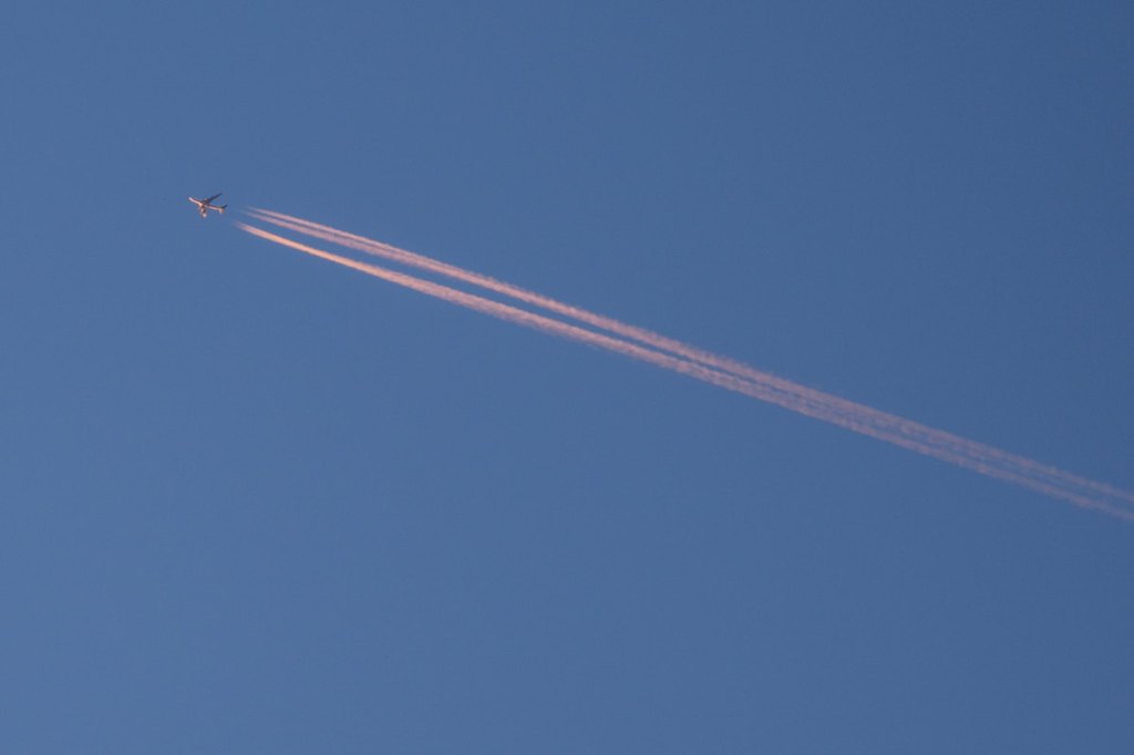 Contrails behind an airplane