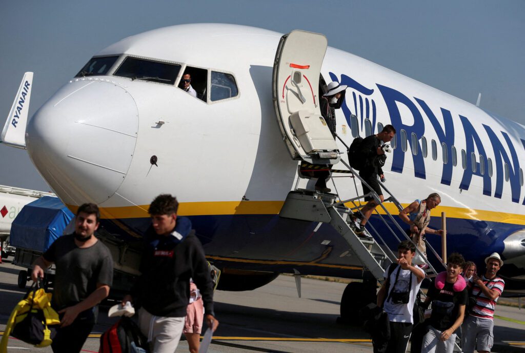 FILE PHOTO Passengers alight from a Ryanair aircraft at Ferenc Liszt International Airport in Budapest