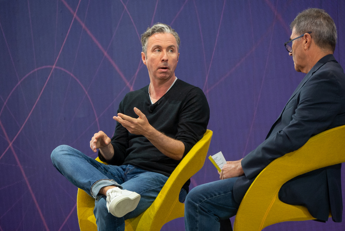 Hopper CEO and co-founder Frederic Lalonde in discussion with Executive Editor Dennis Schaal at Skift Global Forum 2022. Source: Skift