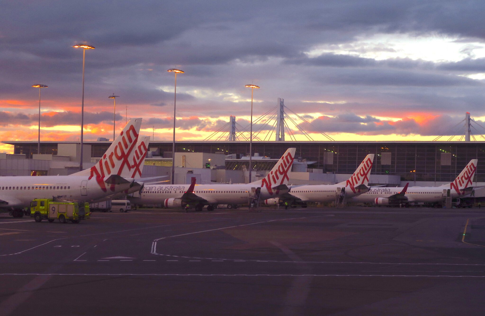 Virgin Australia planes on the tarmac in Sydney, Australia. 