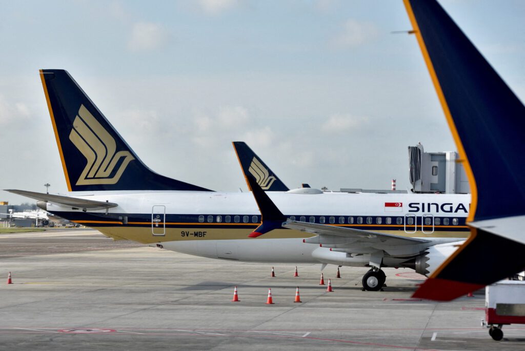 FILE PHOTO Singapore Airlines planes sit on the tarmac at Changi Airport in Singapore