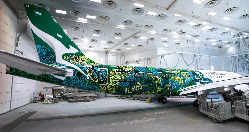 The QantasLink A220 livery at the Airbus facility in Canda.