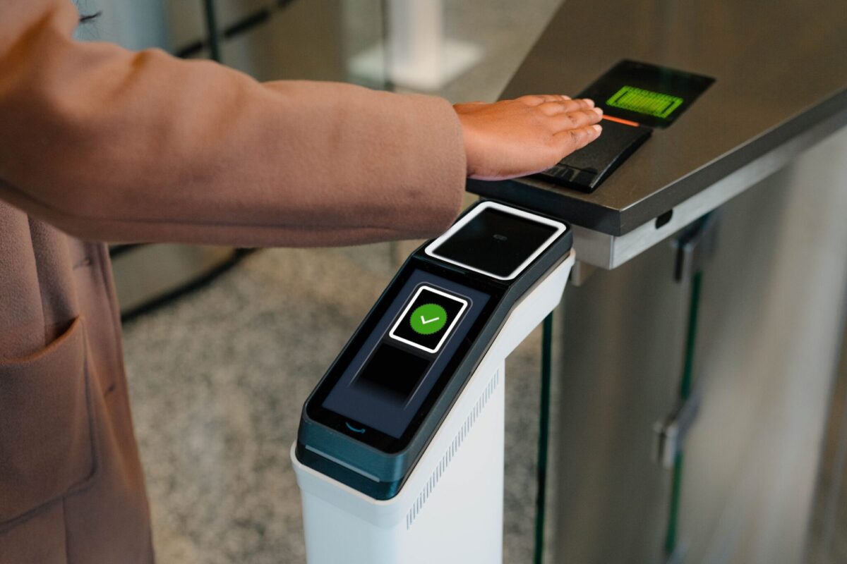 Amazon Web Services has revealed a number of new AI tools for the travel industry. Pictured: new palm reader for ID verification. 