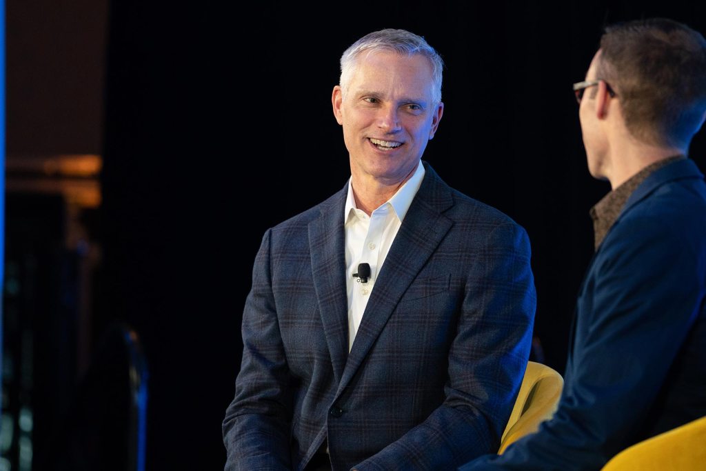 American Airlines CEO Robert Isom speaking on stage