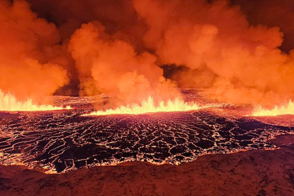 A volcano spews lava and smoke in Grindavik, Iceland, on December 18, 2023. Source: Icelandic Meteorological Office.
