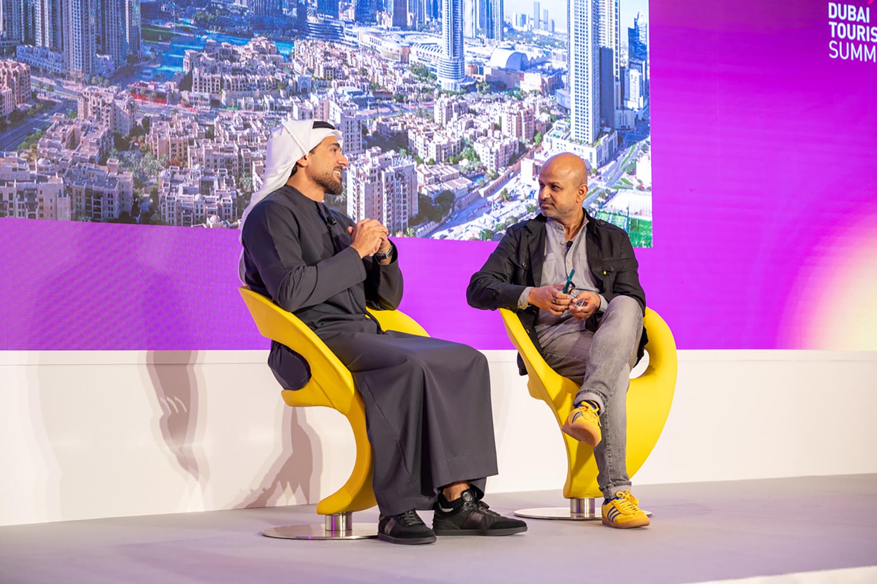 Issam Abdul Rahim Kazim (left), Dubai Corporation for Tourism and Commerce Marketing CEO, speaks with Skift's Rafat Ali at Skift Global Forum East on December 14, 2023, in Dubai, UAE. Source: Skift
