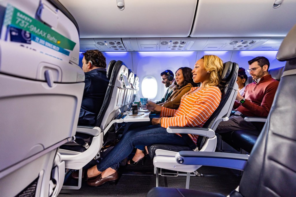 Passengers seated on a plane