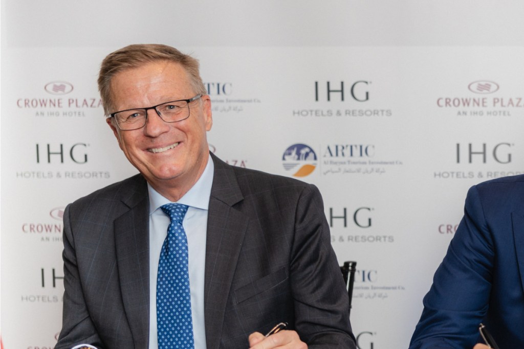 Jolyon Bulley IHG Americas ceo at a 2023 hotel deal signing in new york