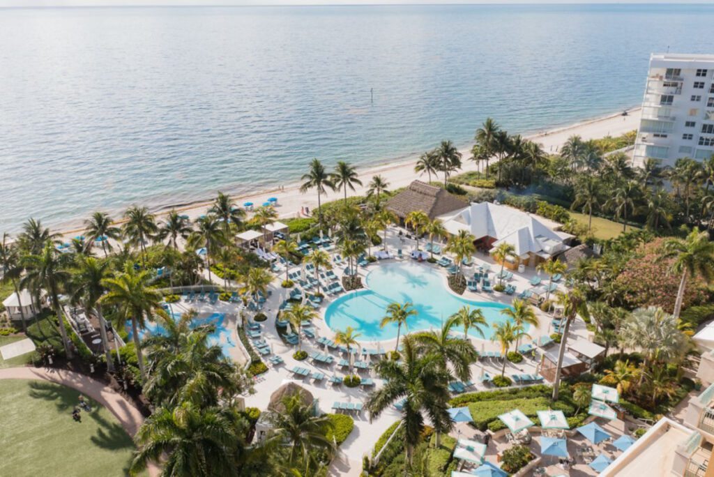 aerial view of swimming pool at Ritz Carlton Key Biscayne resort backed by gencom