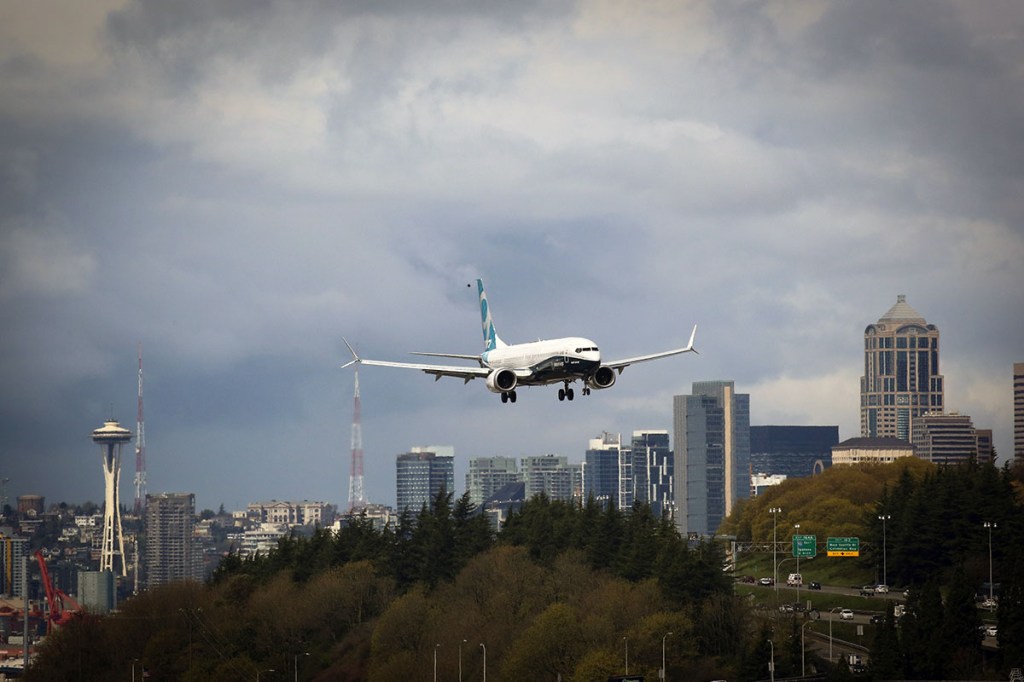 A plane nearing an urban airport