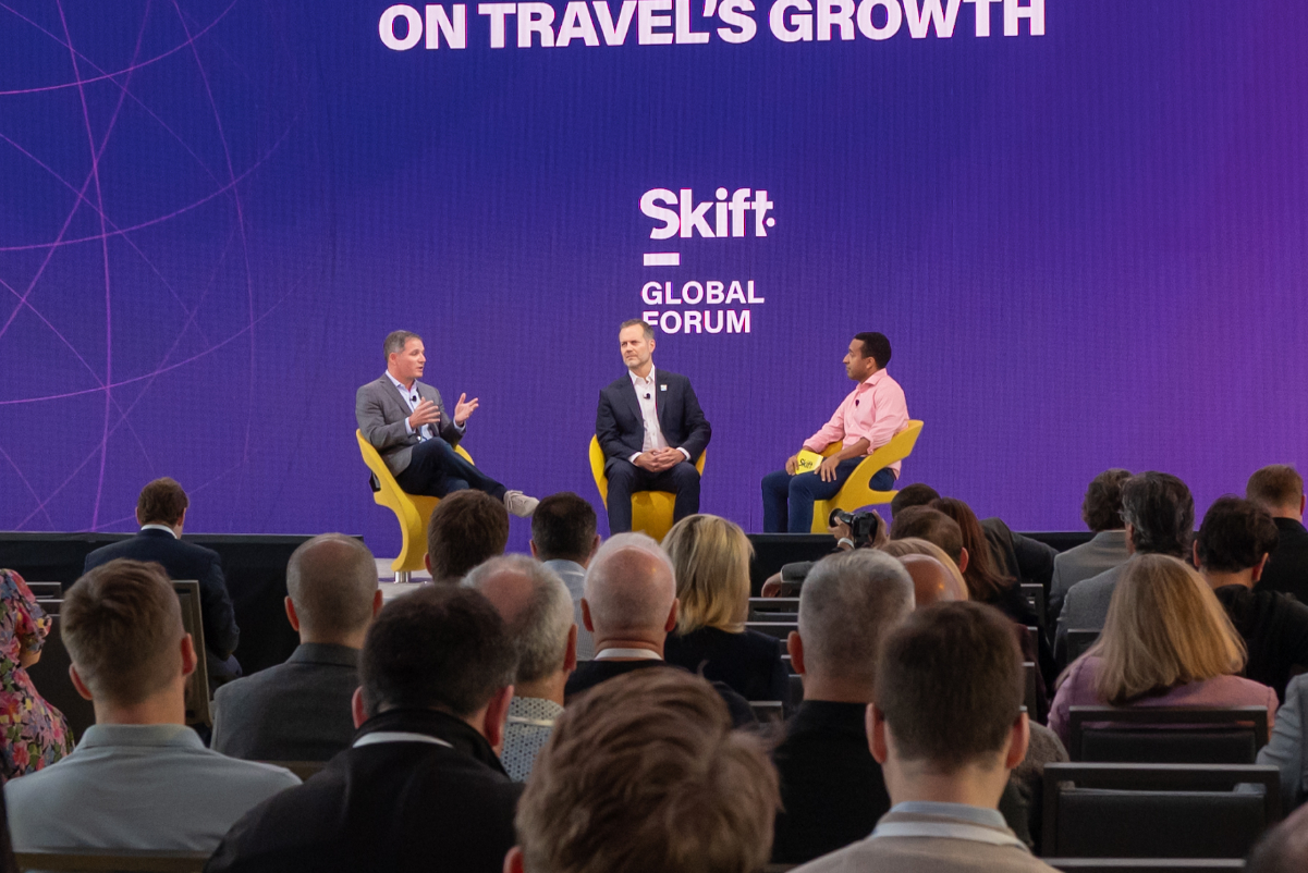 Geoff Freeman, head of the US Travel Association (left) speaking with Fred Dixon of NYC Tourism and Dawit Habtemariam of Skift at Skift Global Forum 2023 in New York City. Source: Skift.