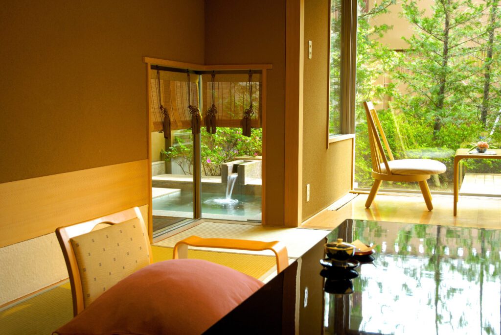 a guest room with an onsen hoshino resorts the kai matsumoto resort in japan source hoshino resorts