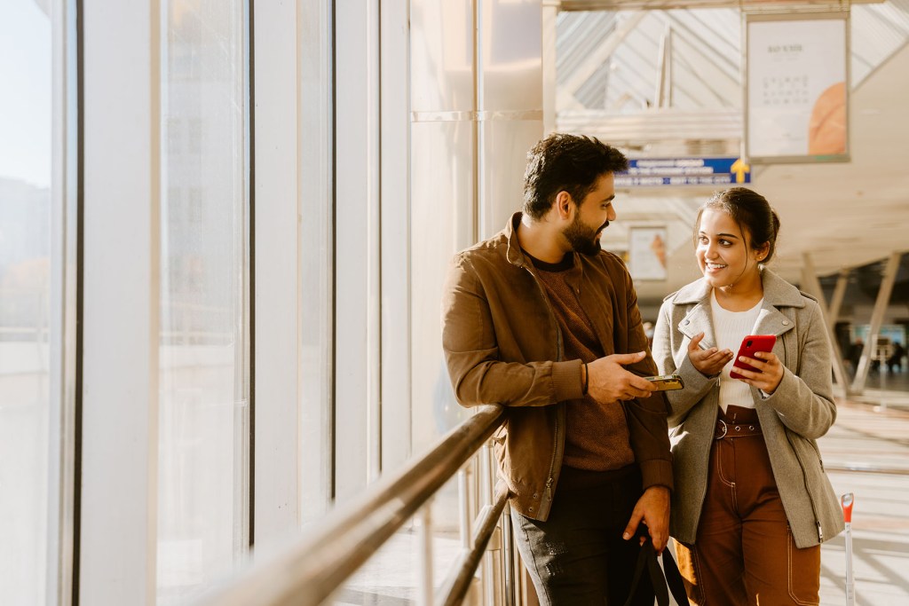 An Indian couple in an airport