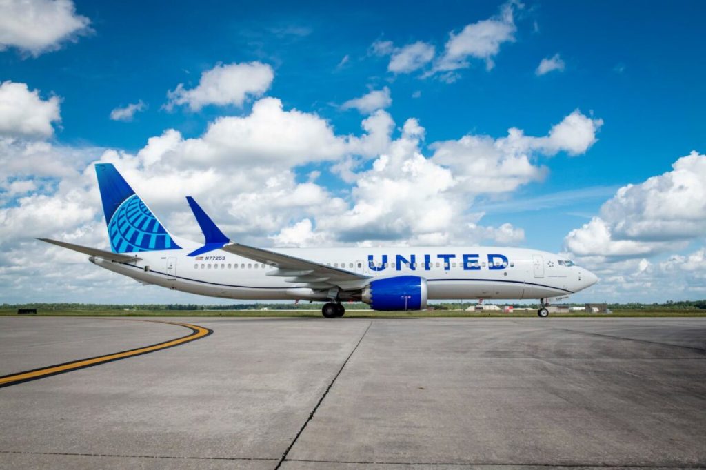 A united airlines 737 max pictured on the ground.