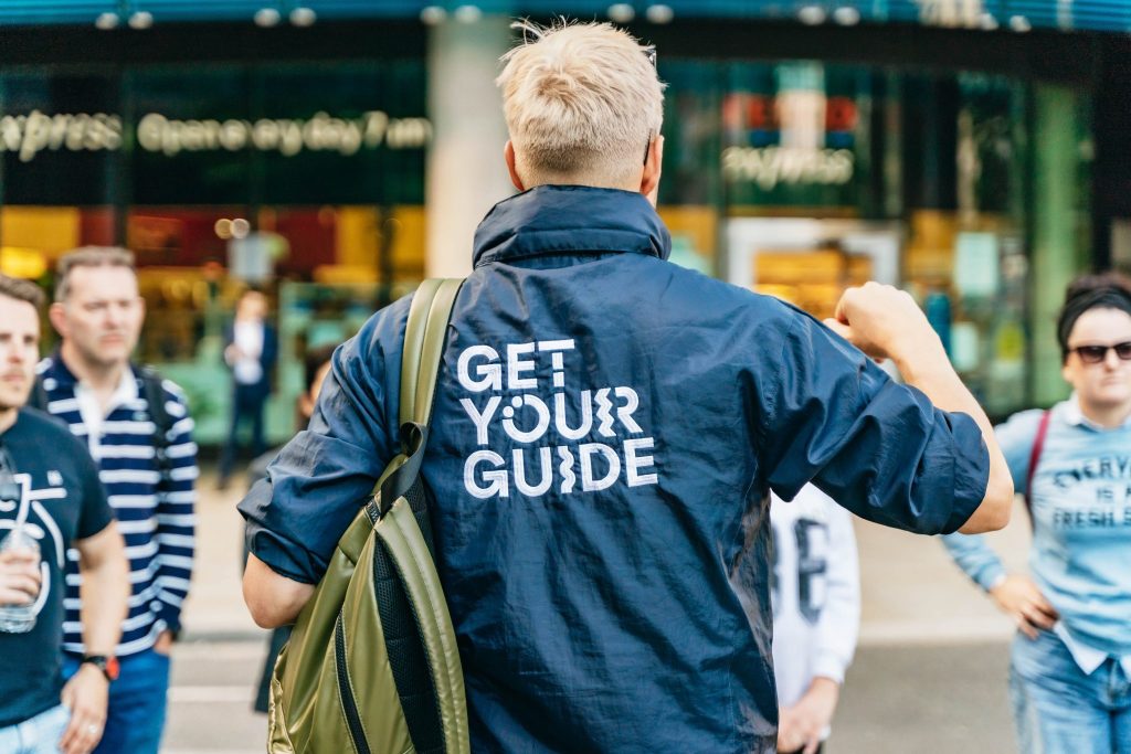 A GetYourGuide tour guide speaking to a group.