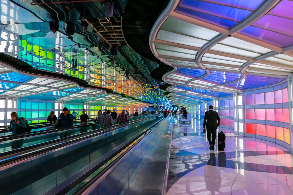 Pictured: Business traveler walking in the Chicago O'Hare International Airport.
