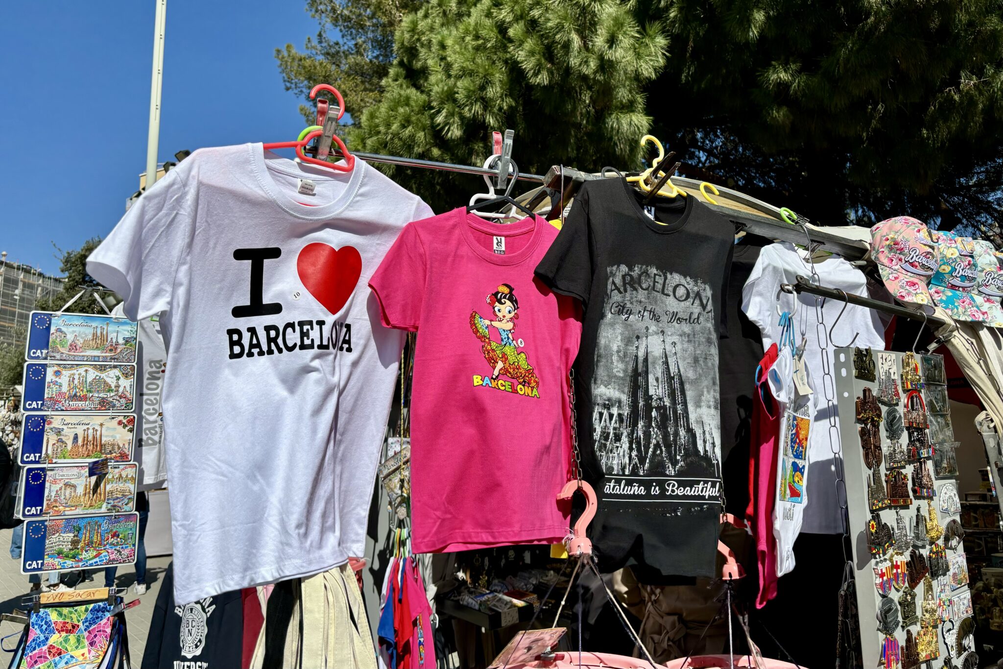 T-shirts and trinkets at an outdoor stand