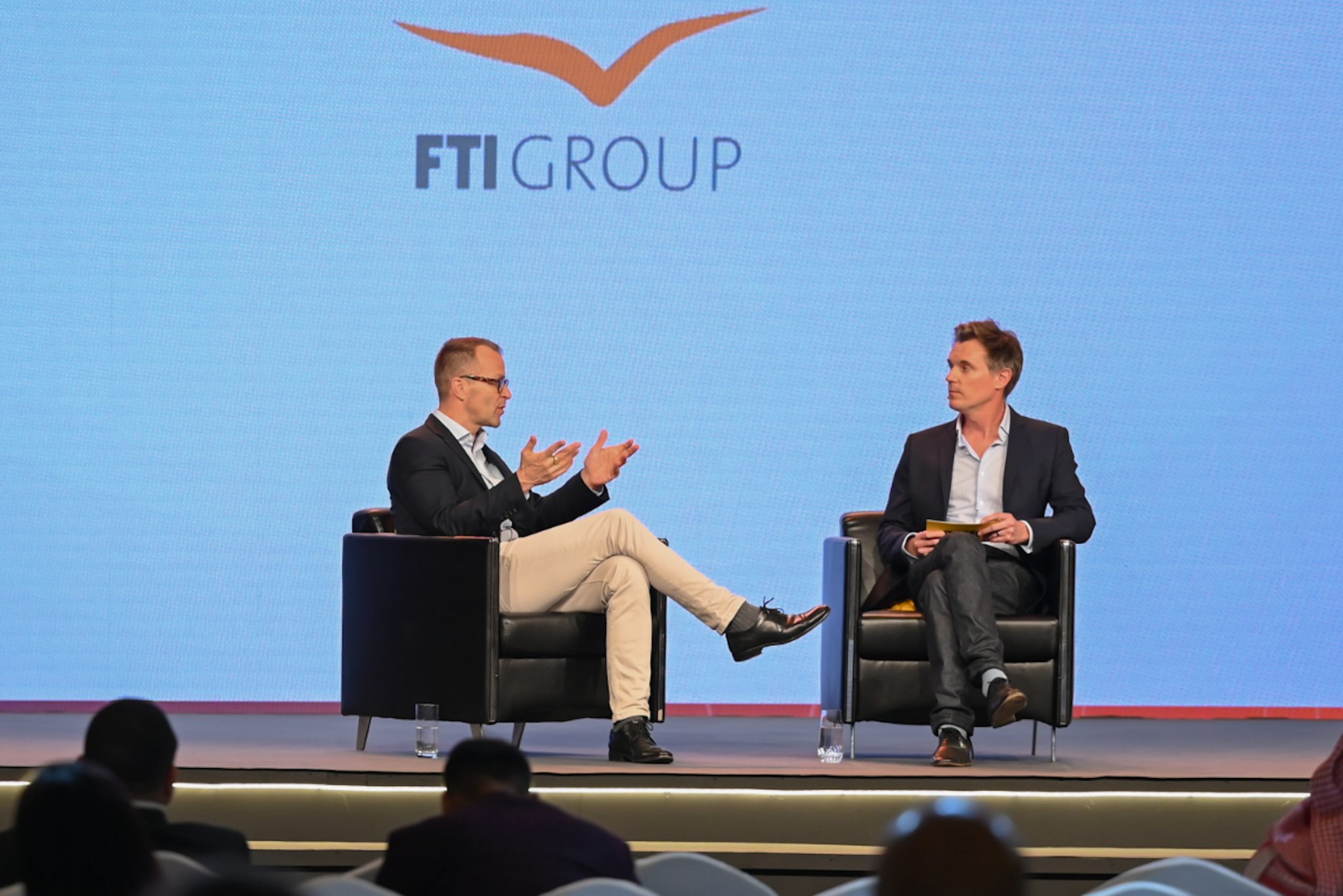 SGFE22 Casper FTI Group skift Casper Urhammer CEO of tour operator FTI Group on stage with Skift Corporate Travel Editor Matthew Parsons at Skift Global Forum East in Dubai Skift