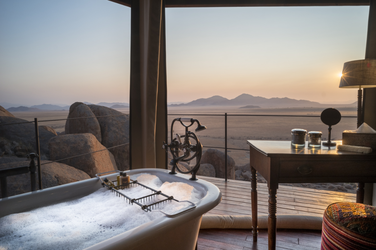 A view from a bath at a remote tented hideouts of Zannier Hotels Sonop in Namibia, now bookable via Hyatt's loyalty program and Mr & Mrs Smith. Source: Hyatt.