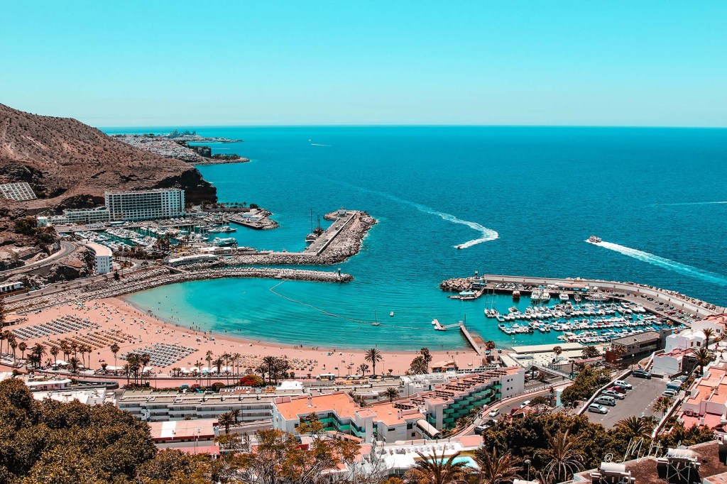 aerial view of a harbor and beach