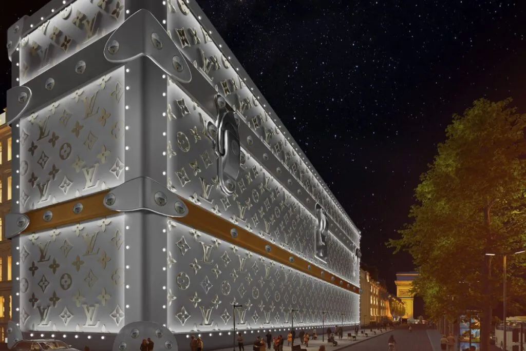 a rendering of what the new louis vuitton building on the CHAMPS ELYSEES is looking like with an advertisement covering the facade with construction underneath, shown at night