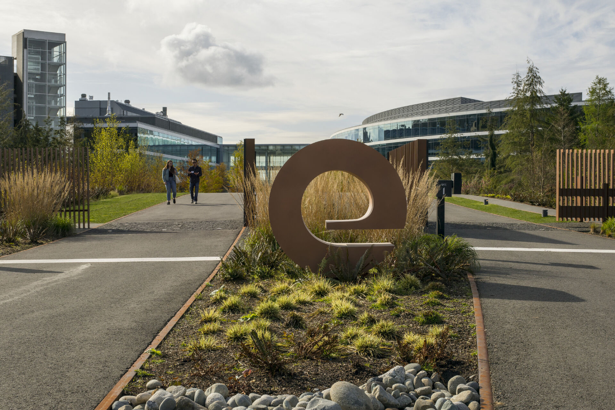 The Expedia Group brand symbol on a pathway to the entrance of the Expedia Group headquarters in Seattle. Source: ZGF.