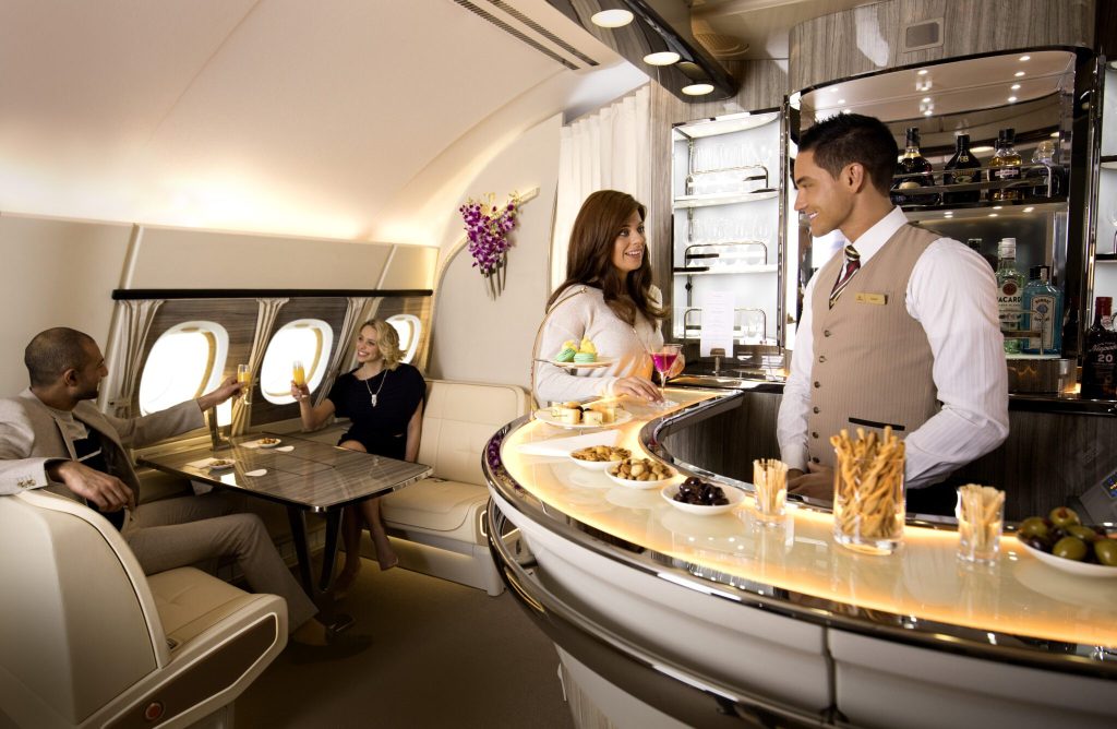 Passengers onboard the Emirates A380 lounge