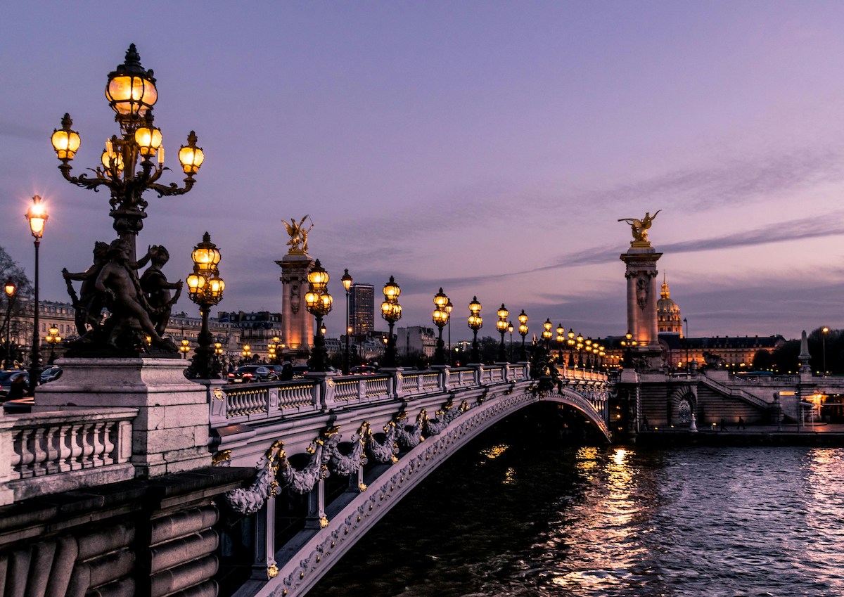 Paris bridge at night.