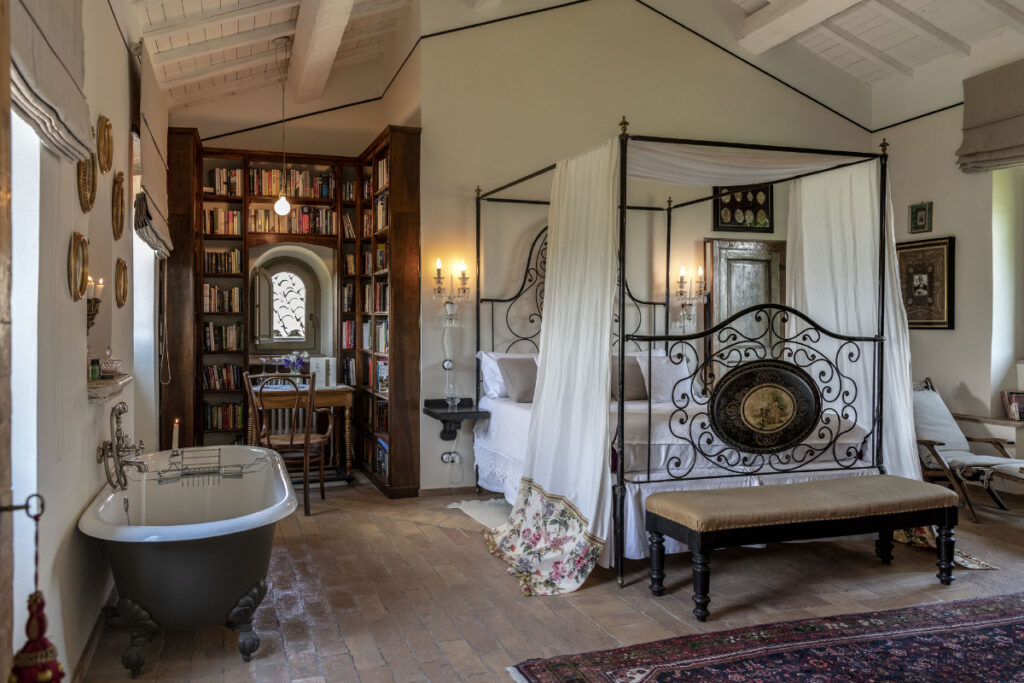 a guestroom at the luxury hotel Corte della Maestà that won a michelin three key designation