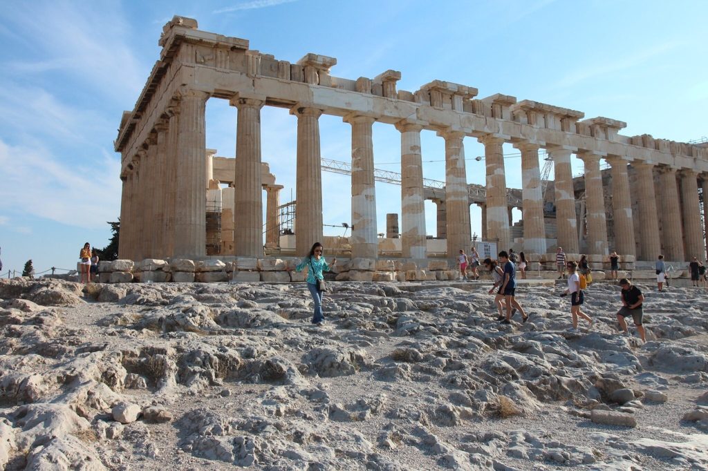 Tourists outside the Acropolis in Athens, Greece.