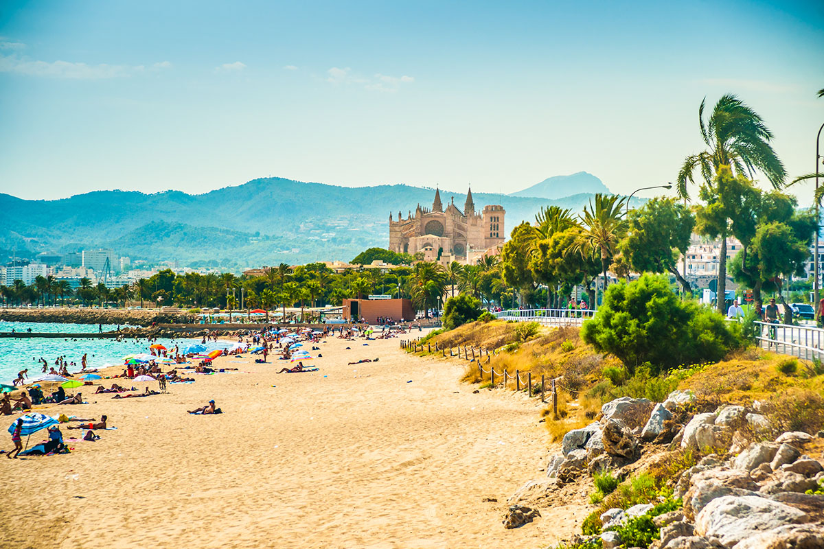 view of a Long Beach with a castle-like building in the background