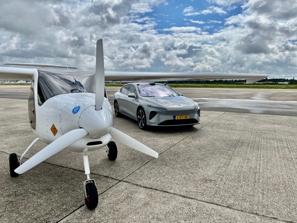 An electric plane and a NIO car