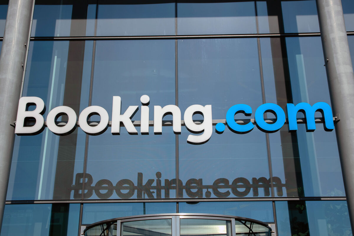 Exterior of a office building with a Booking.com sign