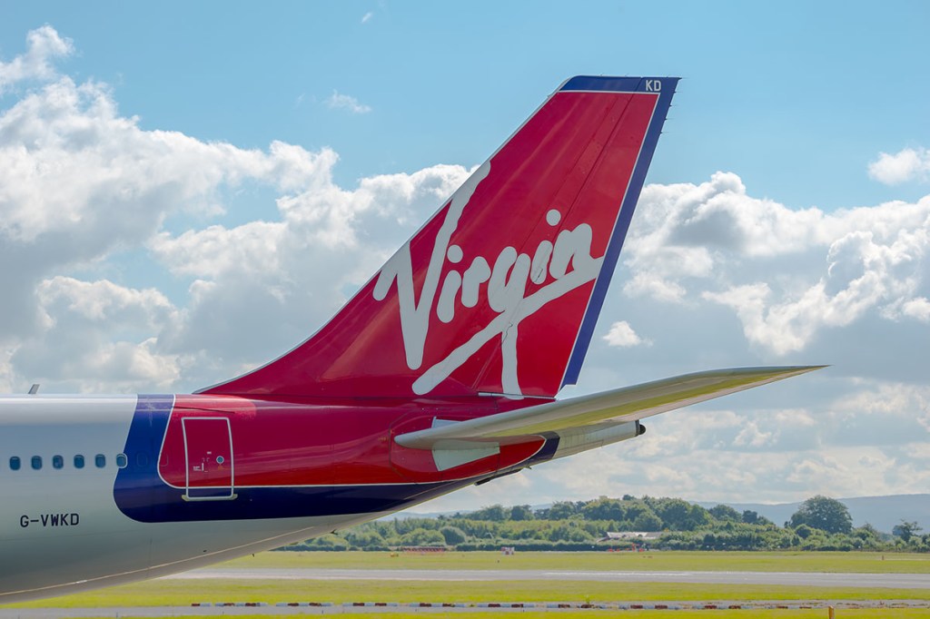 Tail and wings of a Virgin Atlantic aircraft