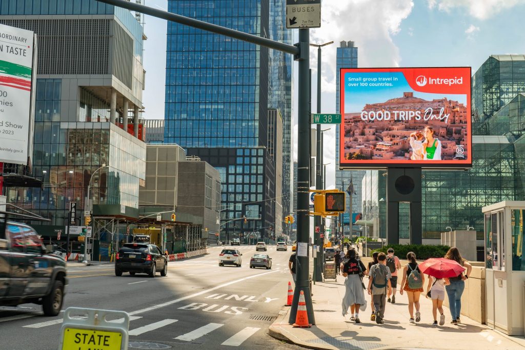 A billboard in New York City showcasing one of Intrepid's "Good Trips Only" advertisements.