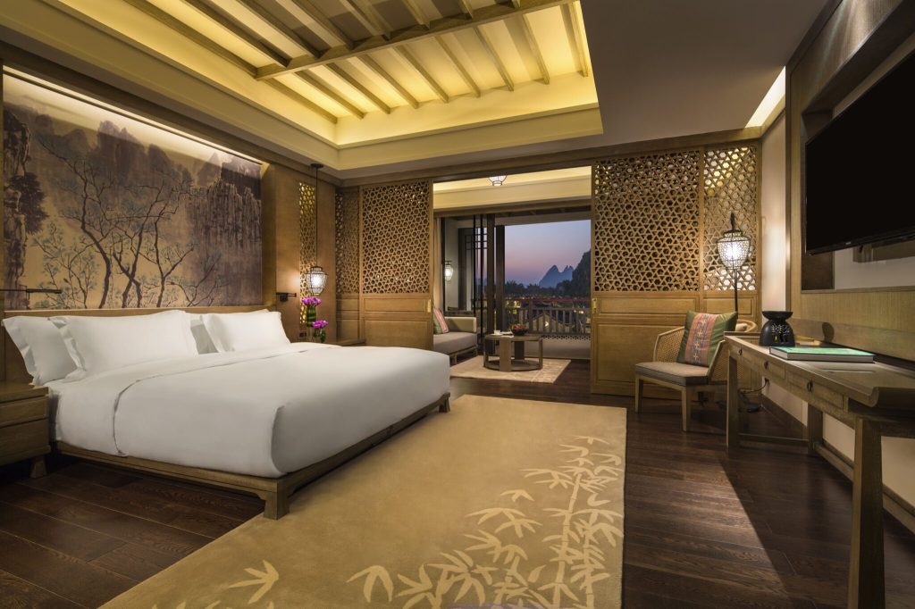 a view of a hotel bedroom with Chinese characteristics at a hotel in China run by Banyan Group