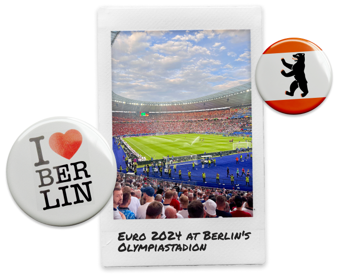 Polaroid image of football stadium during 2024 Euros Finals at Berlin Olympiastadion with two pin badges either side