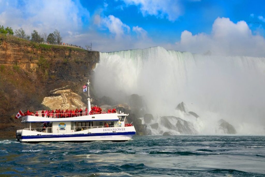 A Hornblower ship in front of Niagra Falls