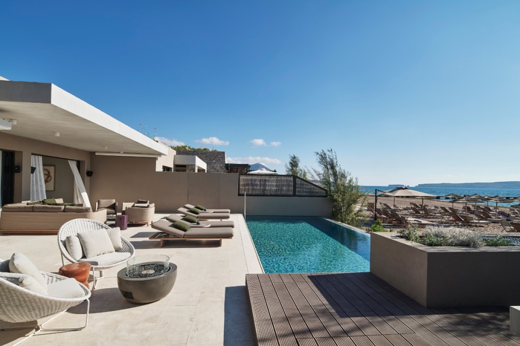 a pool deck at a fancy hotel