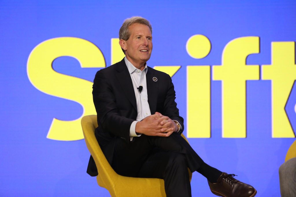 Geoff Ballotti, Wyndham Hotels & Resorts President and CEO on stage at Skift Global Forum 2024